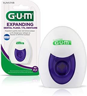Gum expanding dental floss is a dental floss that is purple and white.