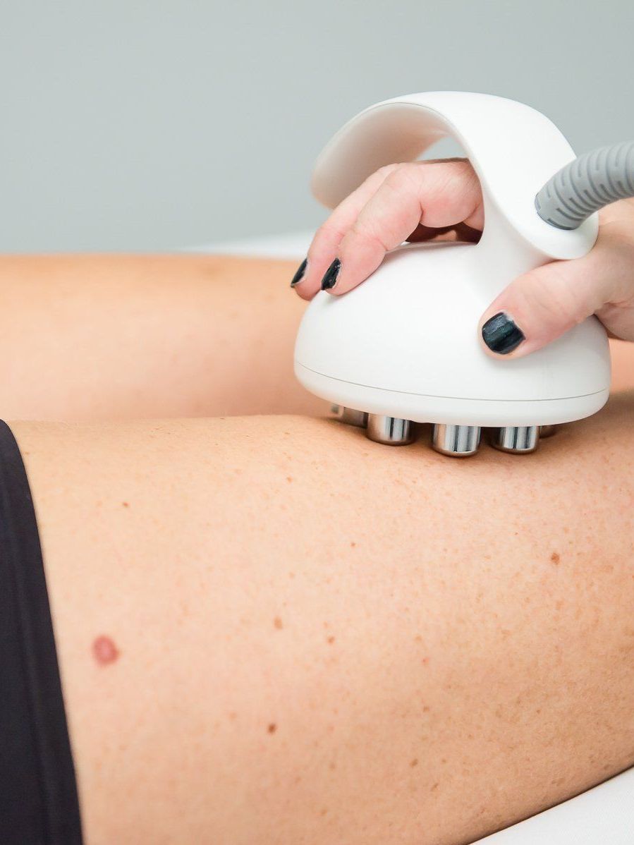 A woman is getting a massage on her leg