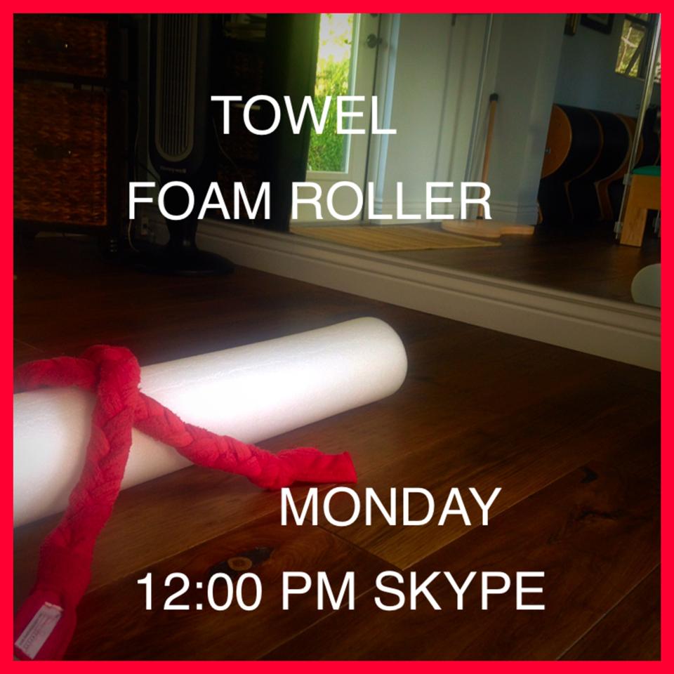 A towel foam roller is laying on the floor on monday at 12:00 pm skype