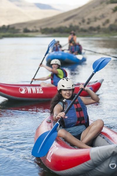 Woman in A Red Kayak