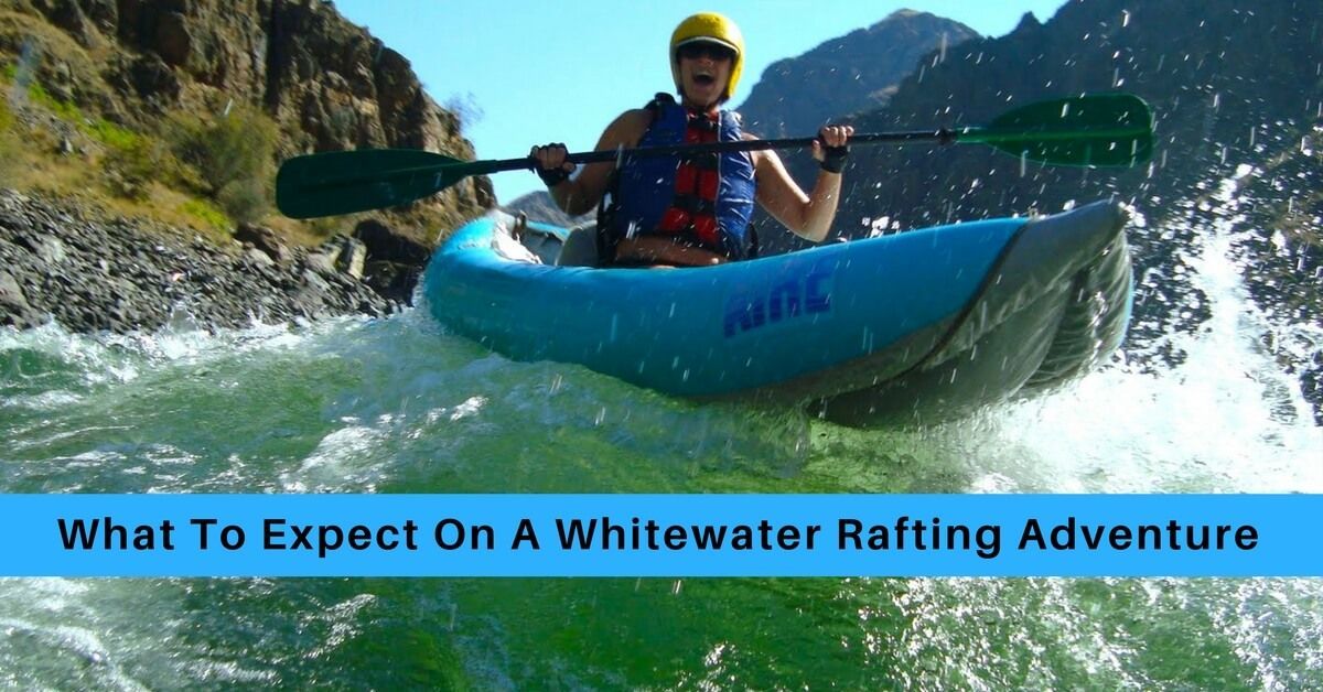 Person in A Blue Kayak Is Going Through a River