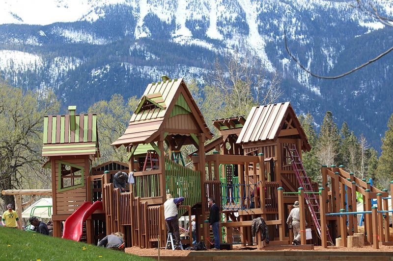 Large Wooden Playground with Mountains in The Background