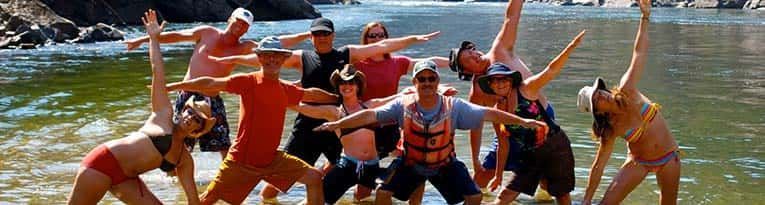 Group of People Are Posing for A Picture in Water
