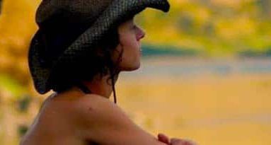 Woman Sitting and Looking at The River