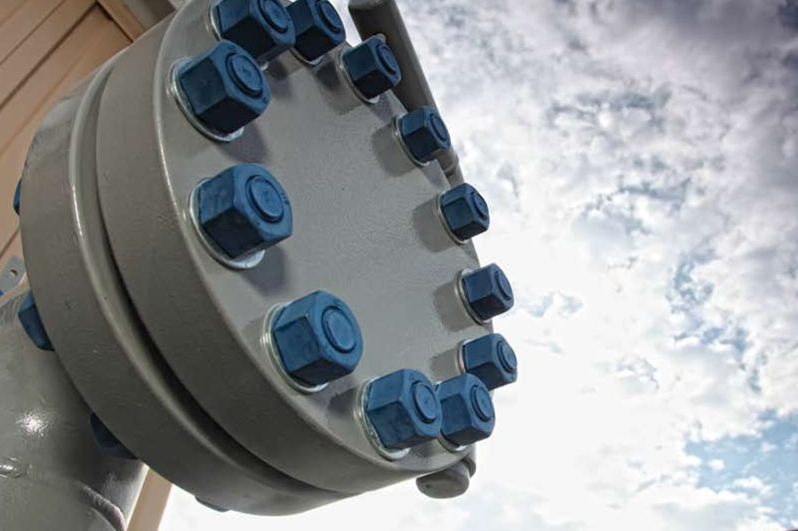 Flange showing the industrial coating services provided by Pipeline Equipment, Inc.