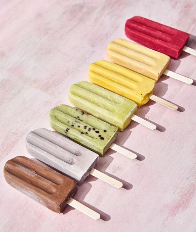 A yellow popsicle with a ucsf sticker on it