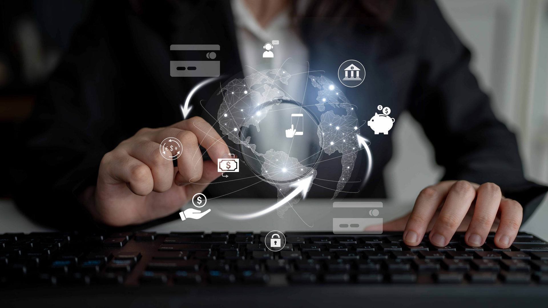 Person using a keyboard, digital globe with icons representing online transactions.