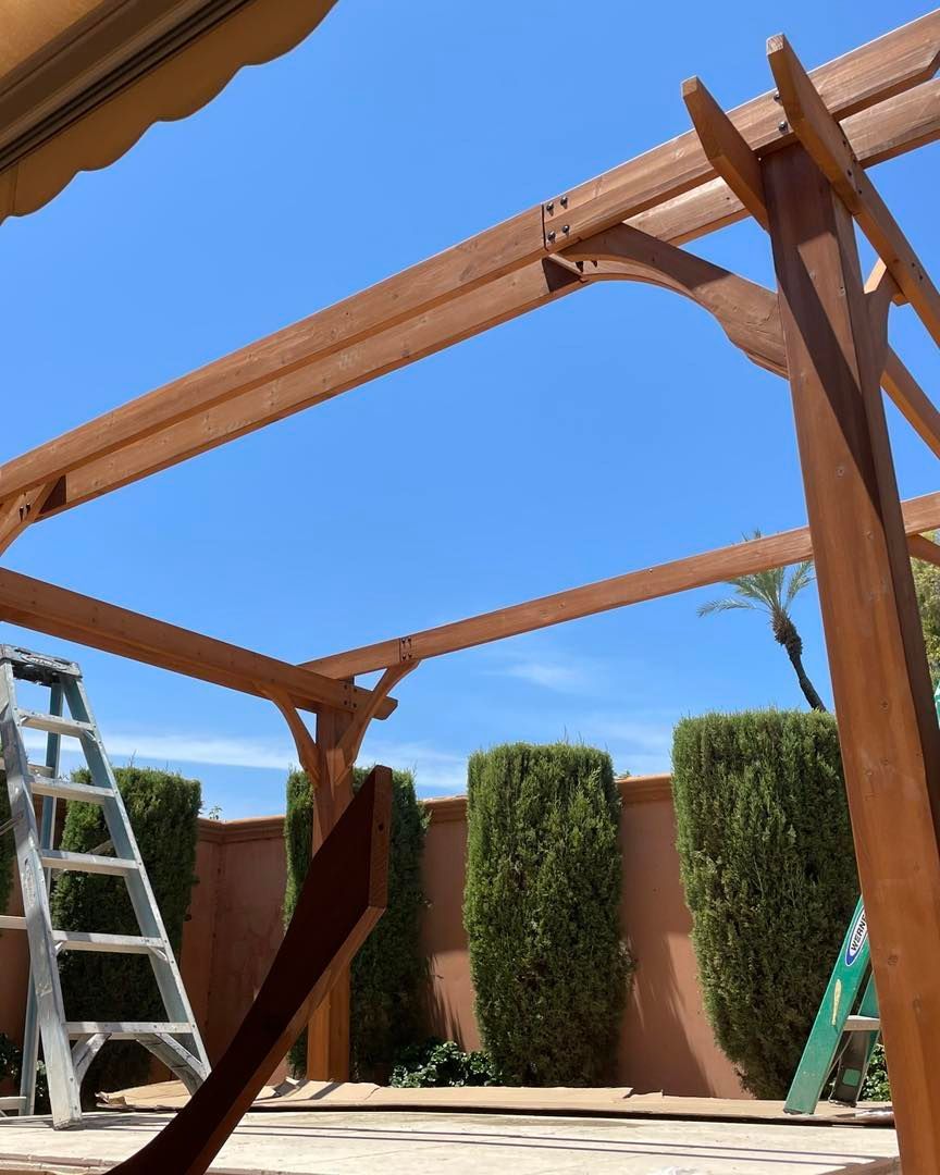 Image of a pergola that is being build by a construction team in Coachella Valley.