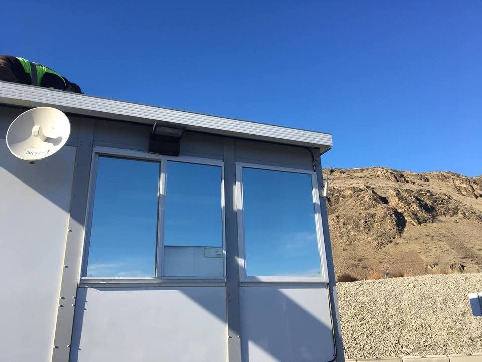 A building with a satellite dish on top of it