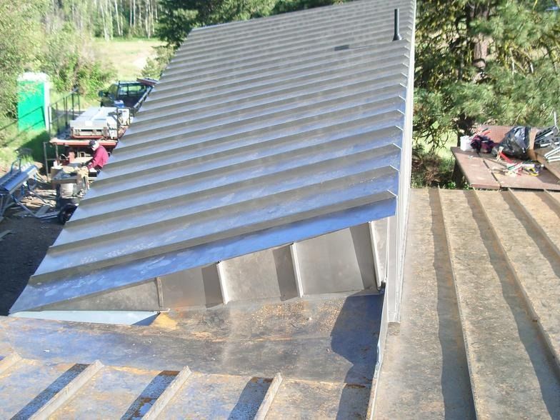 A roof with a lot of shingles on it