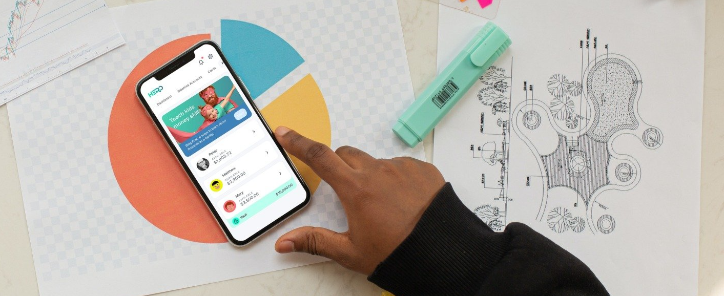 Teenager uses Hero Financials app on his phone