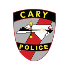 The cary police logo is a shield with a map of north carolina on it.