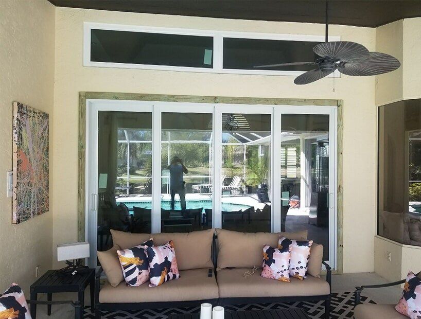 Balcony of the House with Brown Couch — Windows in Bradenton, FL