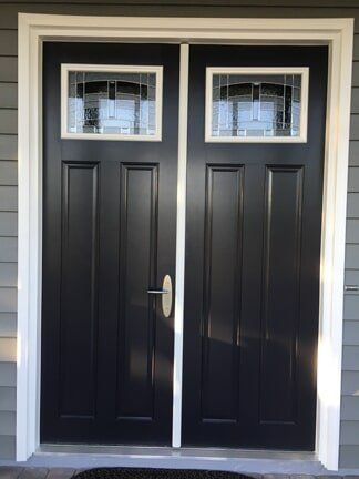 Black Door With White Outline And Glass Window — Windows in Bradenton, FL