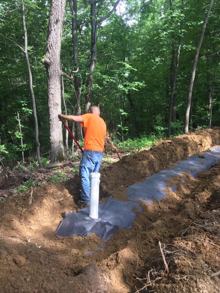 Man Working — Black River Falls, WI — Callahan & Son Plumbing & Septic