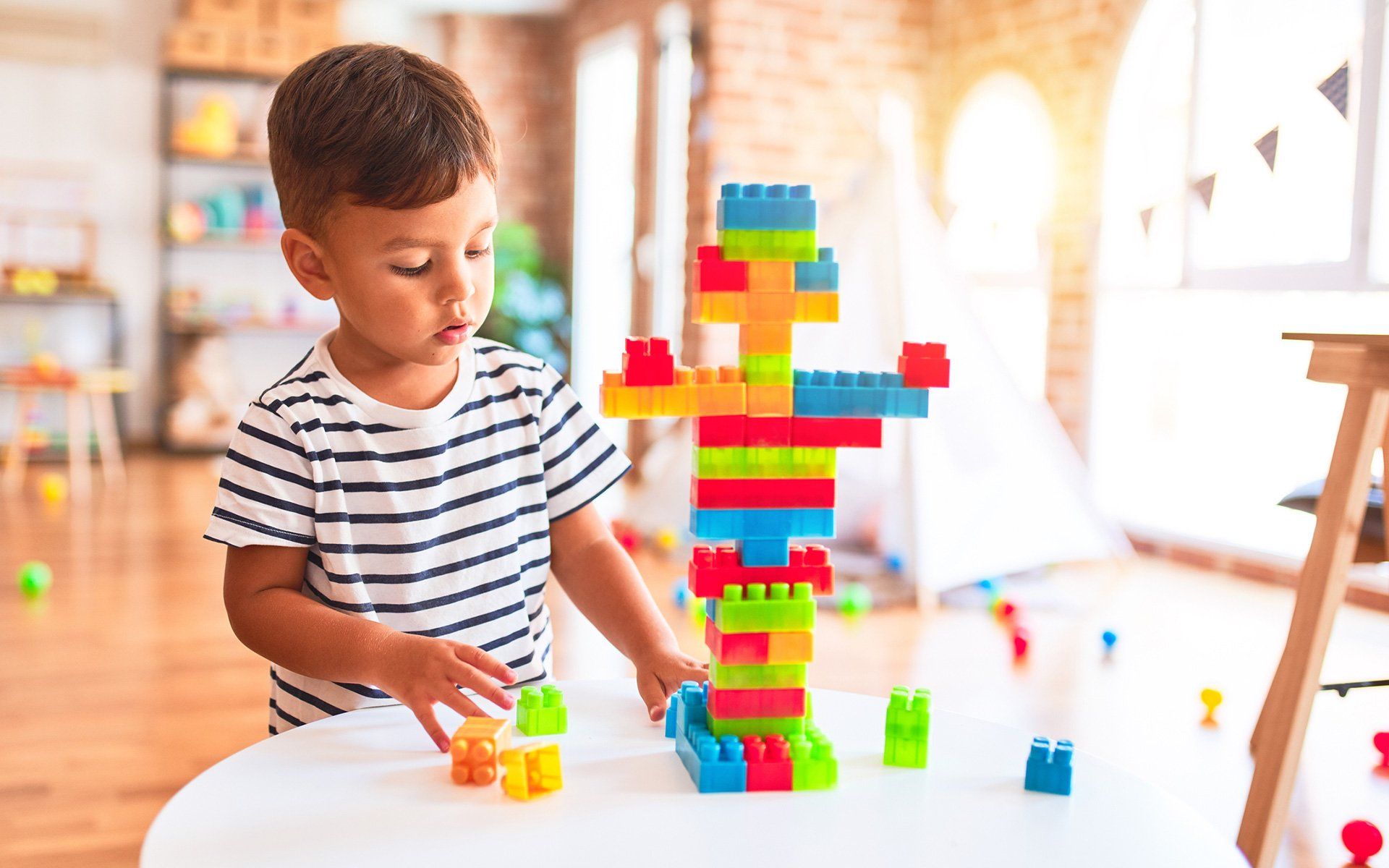 Boy Playing With Lego — Silverdale, WA — Central Valley Child Care
