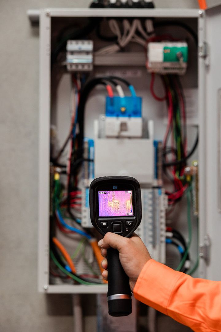 A Person Holds a Thermal Camera — API Engineering in Charmhaven, NSW