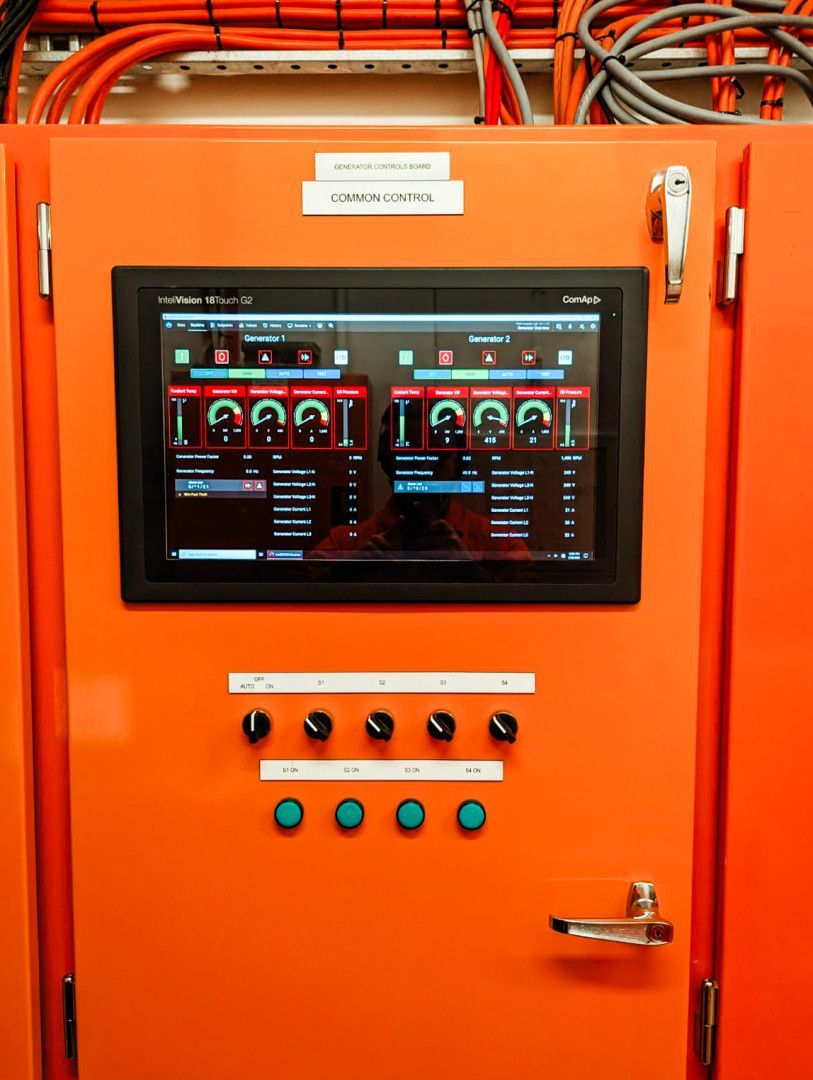 Orange Electrical Control Panel With a Digital Touchscreen — API Engineering in Charmhaven, NSW