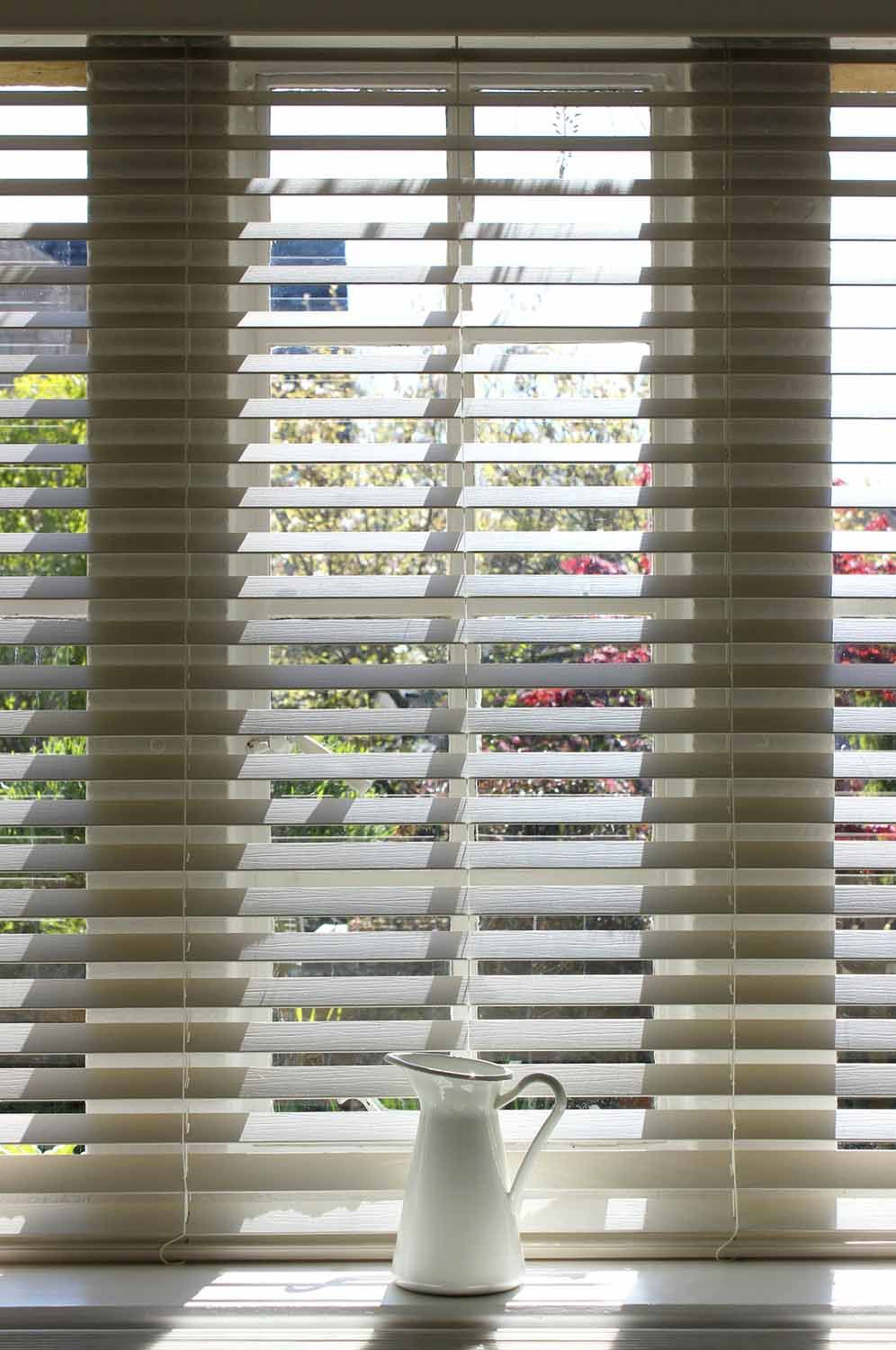 Window With White Blinds and a White Pitcher — Wow Clean Cairns in Bayview Heights, QLD