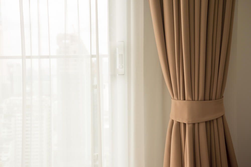 Sunny Curtain in Warm Natural Light — Curtain & Blind Cleaners in Bayview Heights, QLD