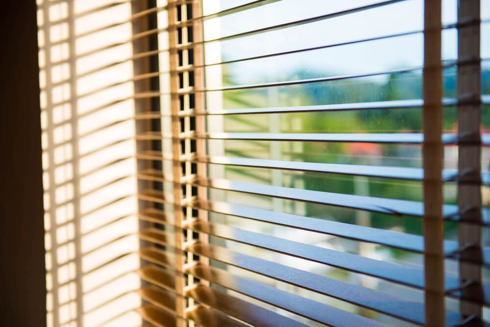 Close-up of Thin Window Blinds — Curtain & Blind Cleaners in Bayview Heights, QLD