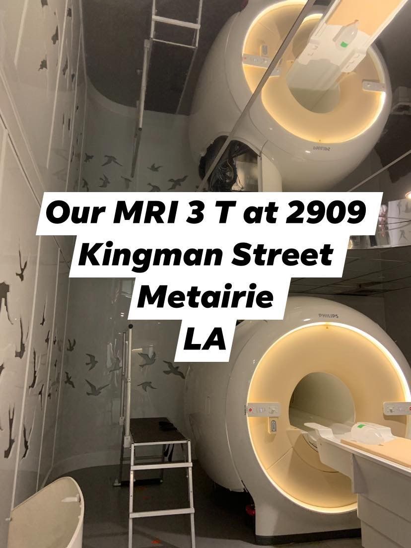 A picture of a mri machine that says our mri 3 t at 2909 kingman street metaire la