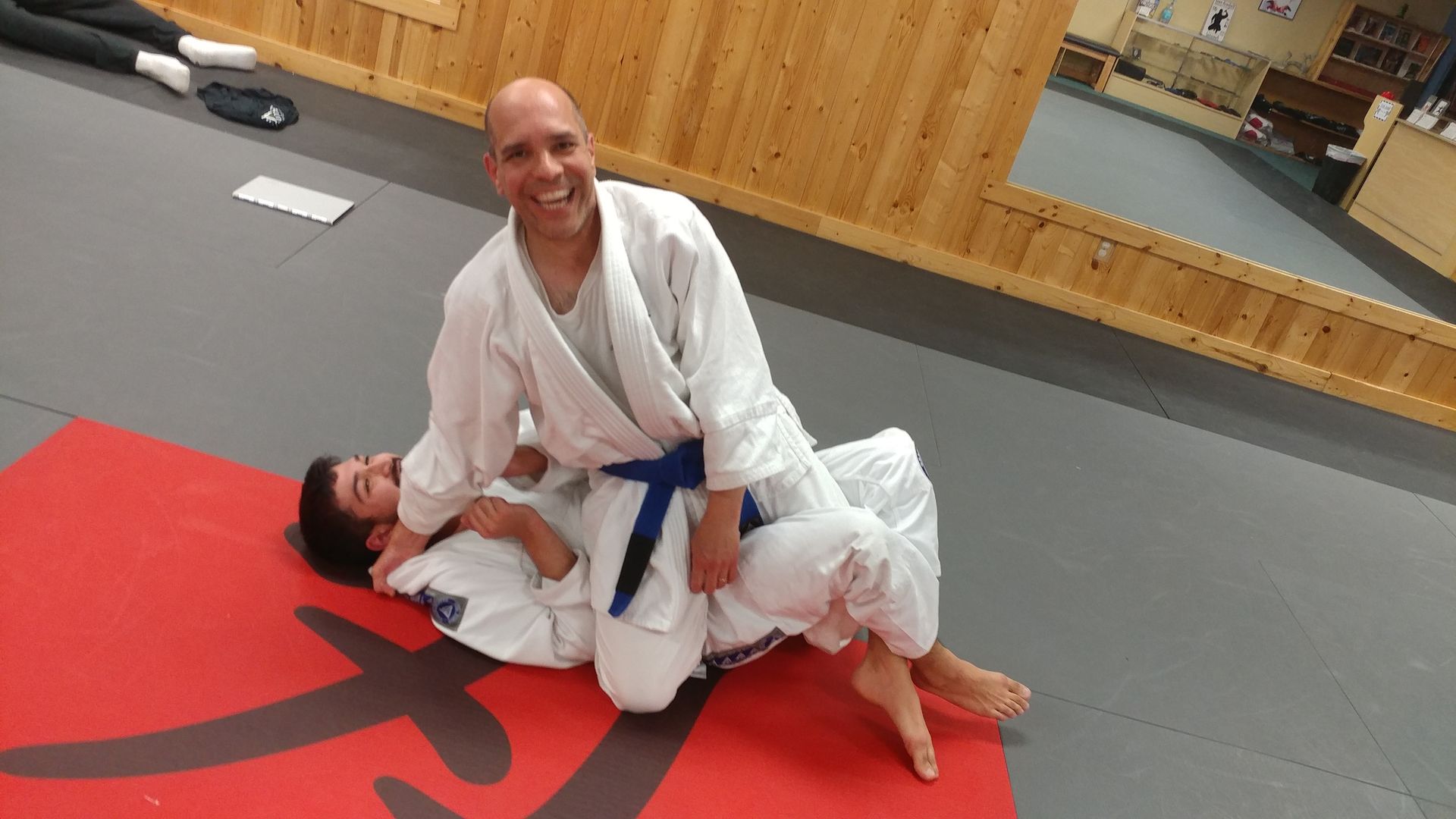 Family students practicing controlled grappling at Centerline Jiu-Jitsu Chandler in Chandler, AZ.