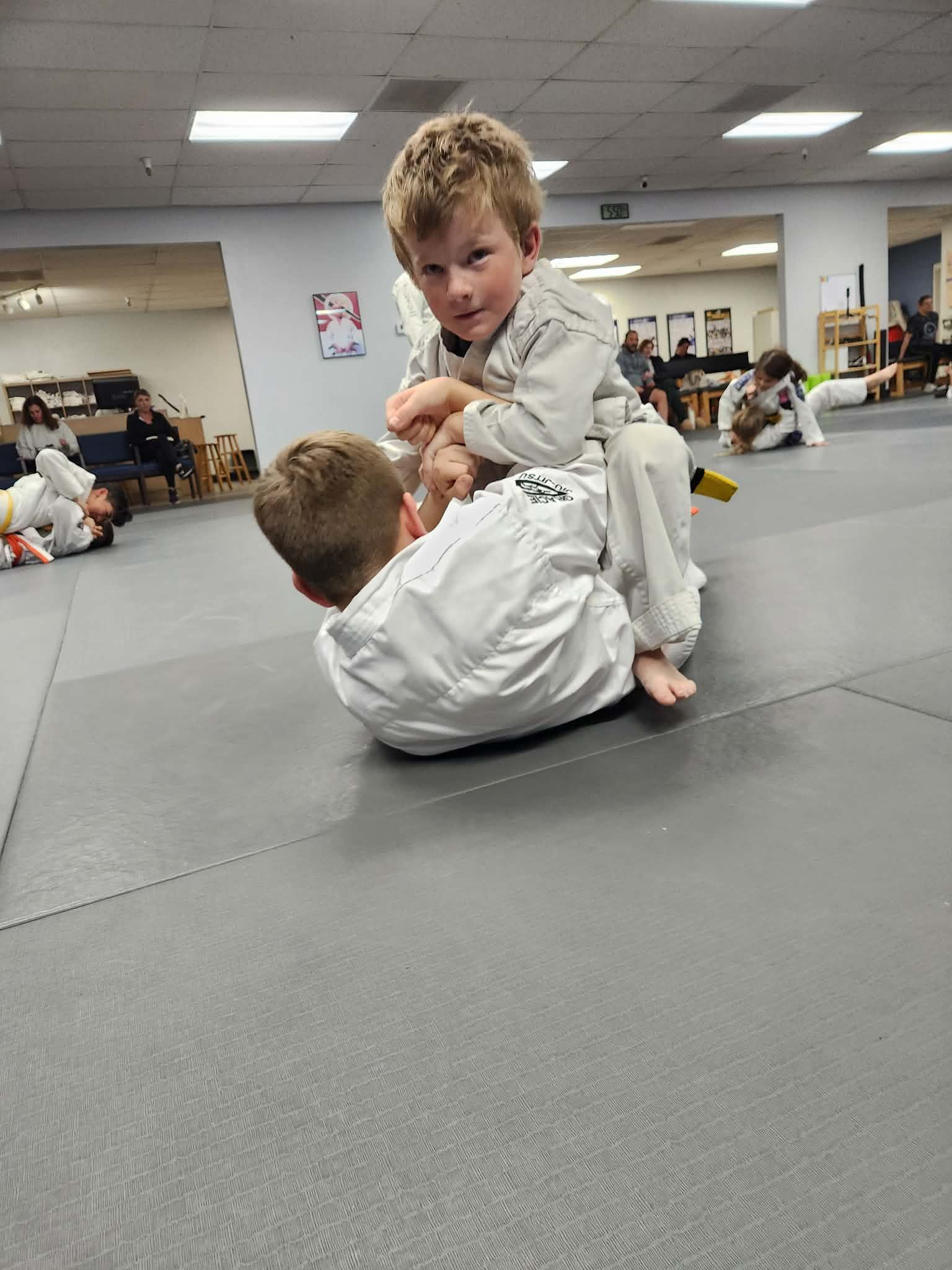 Students practicing Jiu-Jitsu drills at Centerline Jiu-Jitsu Chandler in Chandler, Arizona.