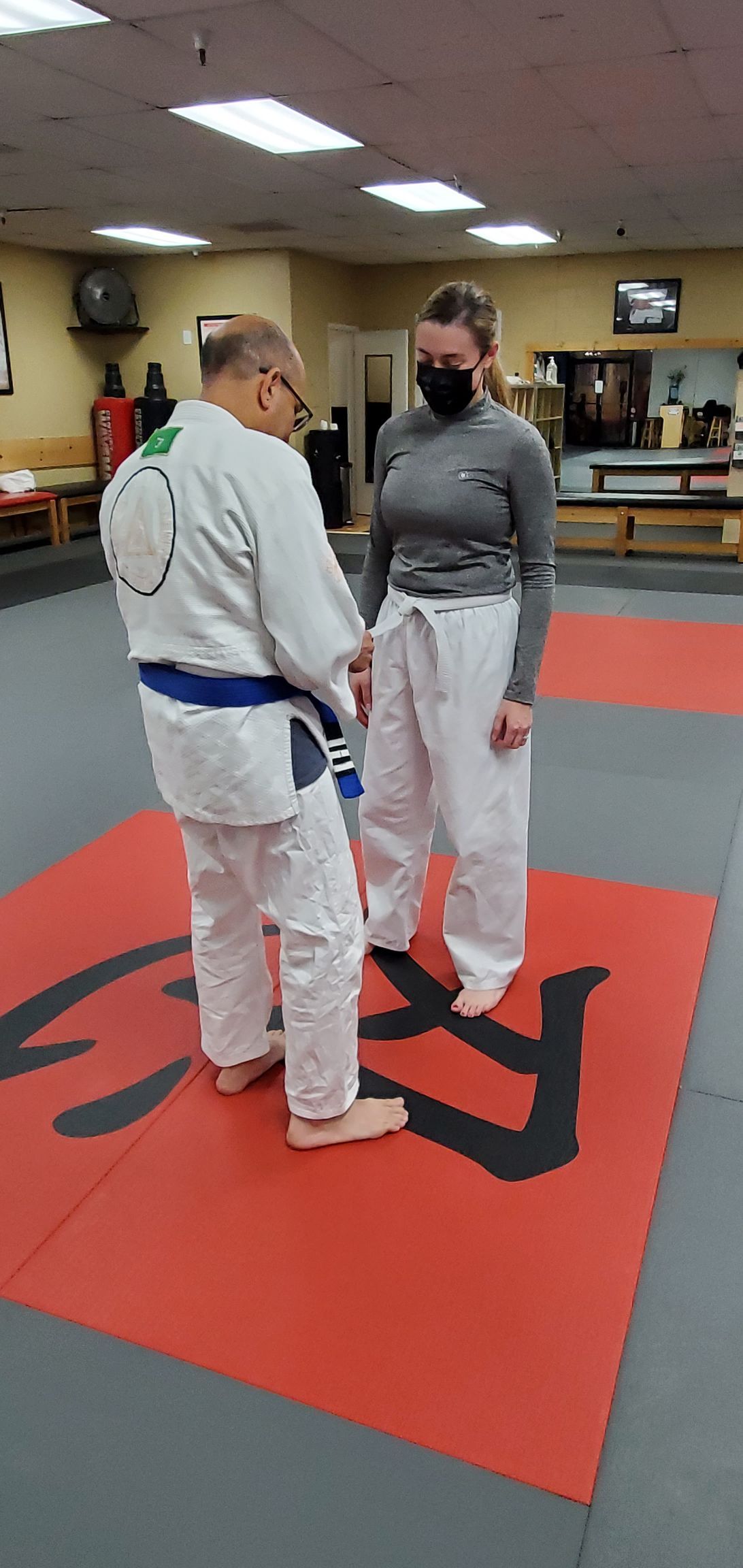 Adults drilling Jiu-Jitsu at Centerline Jiu-Jitsu Chandler in Chandler, Arizona to build focus and resilience