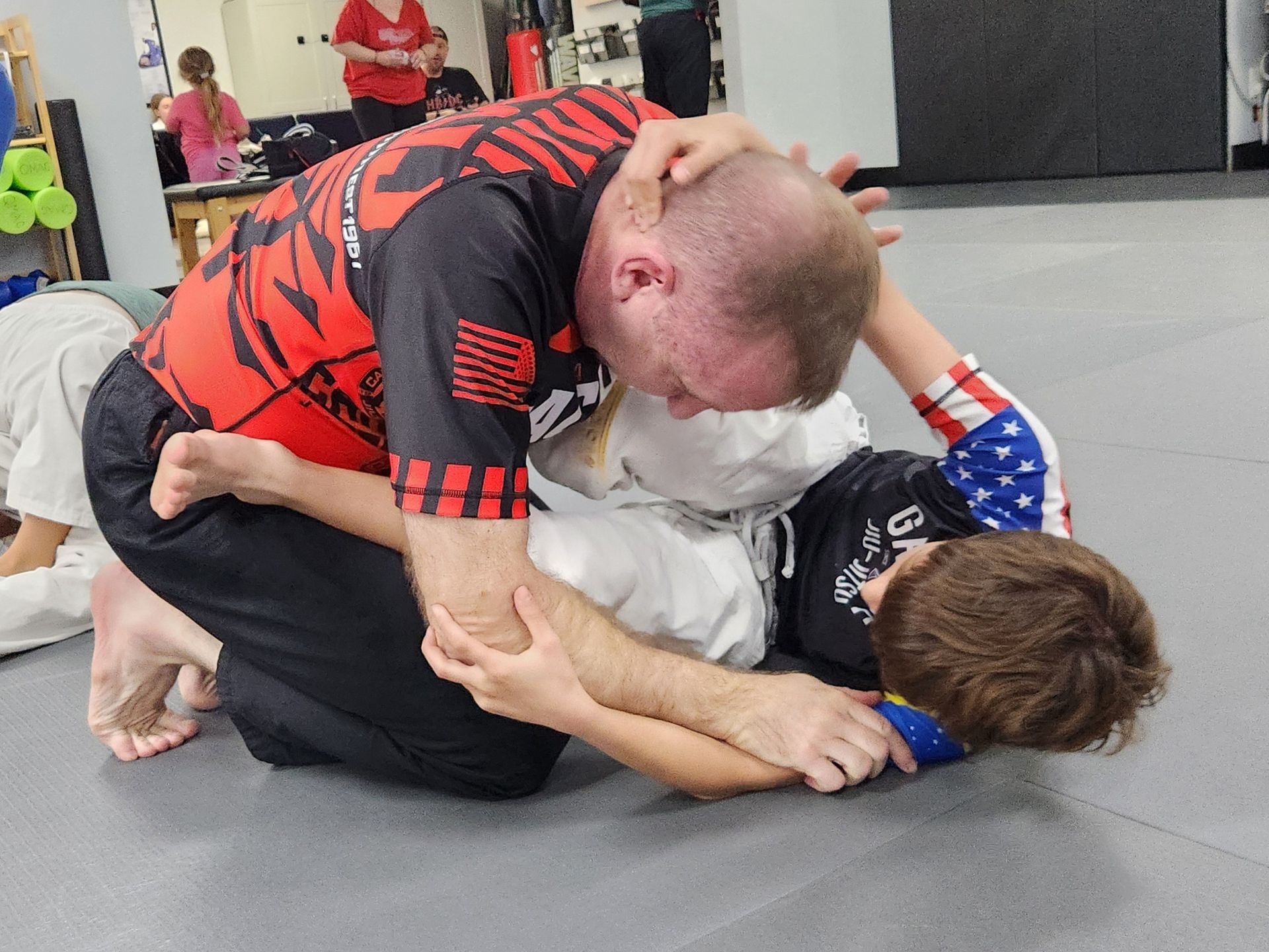 Students practicing Jiu-Jitsu drills at Centerline Jiu-Jitsu Chandler in Chandler, Arizona to build confidence.