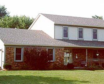 Brown And Gray Roof House — Roofing And Siding in Toledo, OH