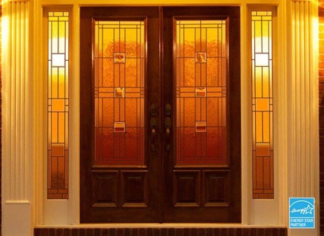 Door With Orange Colored Lighting — Roofing And Siding in Toledo, OH