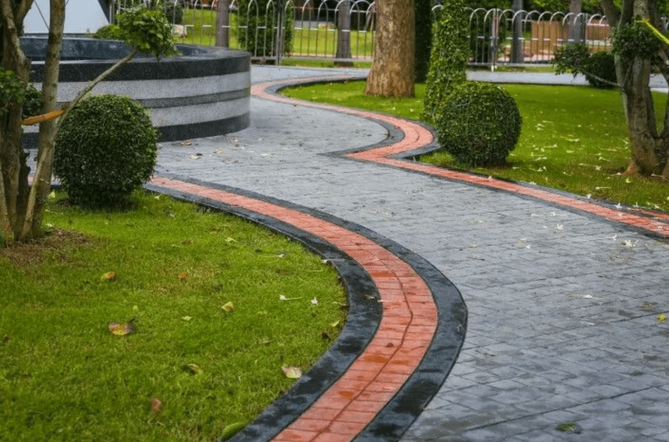 commercial property finished with decorative concrete by a fountain in hamilton, oh