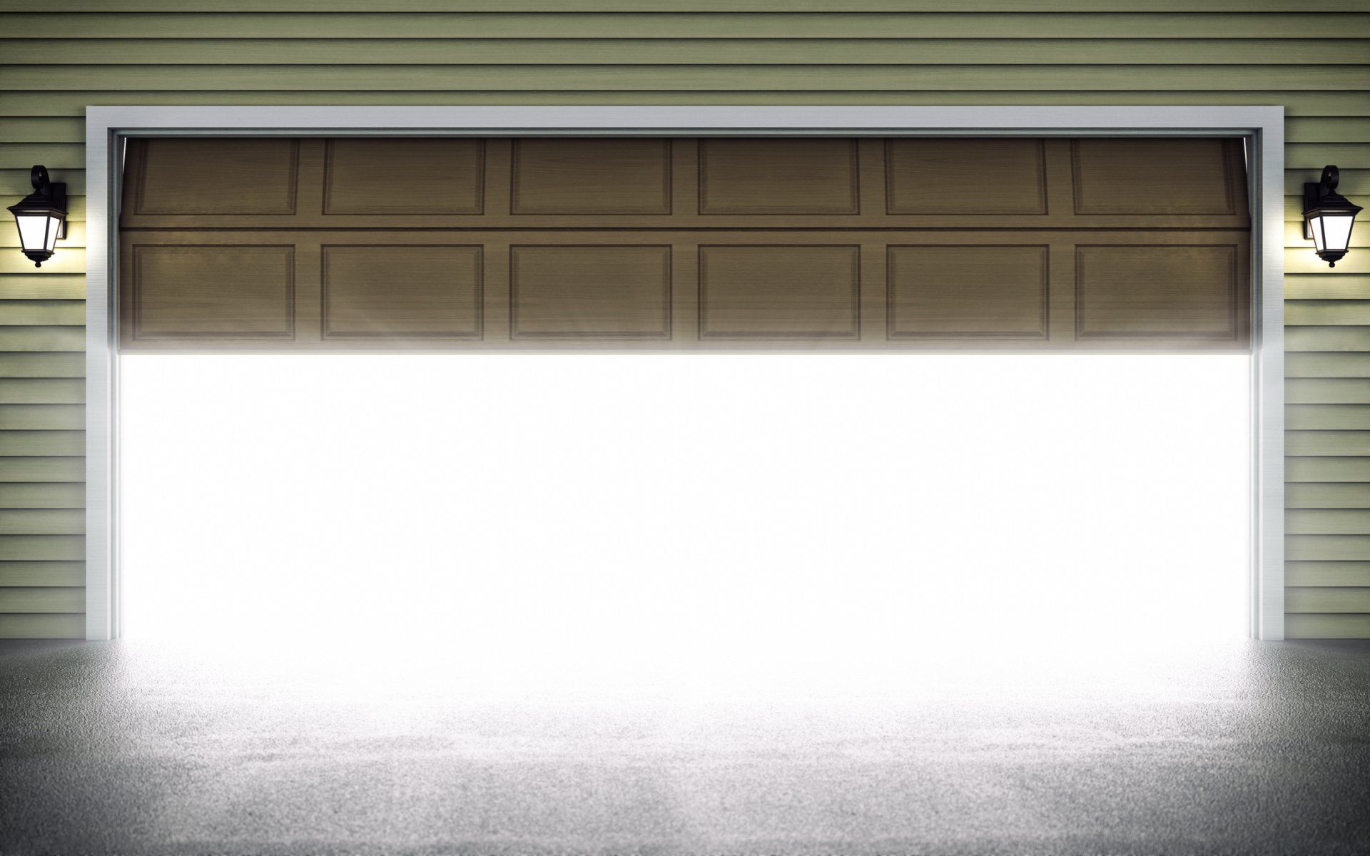 Garage door open, radiating bright light; tan door, cement floor, and yellow siding.
