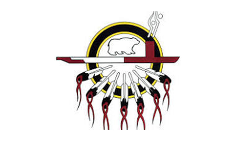 Flag of the Nisga'a Nation: white background with emblem of a bear, feathers, and cross within a circle.