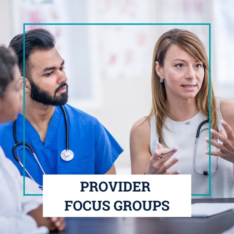 A group of medical professionals in scrubs and lab coats sitting at a table during a provider focus group meeting.