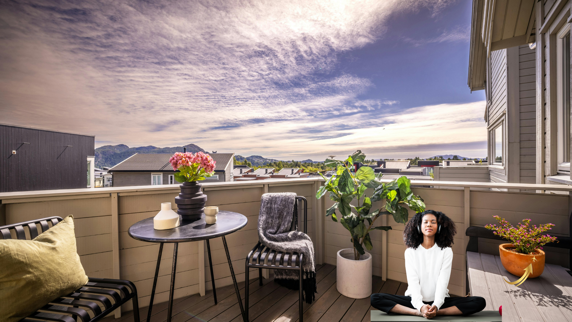 Woman at home meditating and thinking of her vacation on her balcony 