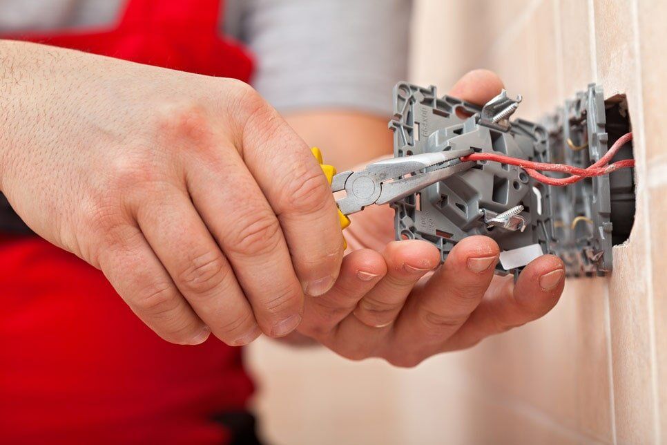 Electrician Fixing Wires — Electrical Services  in Jensen, QLD