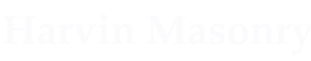 Marvin Masonry logo, white text on white background.