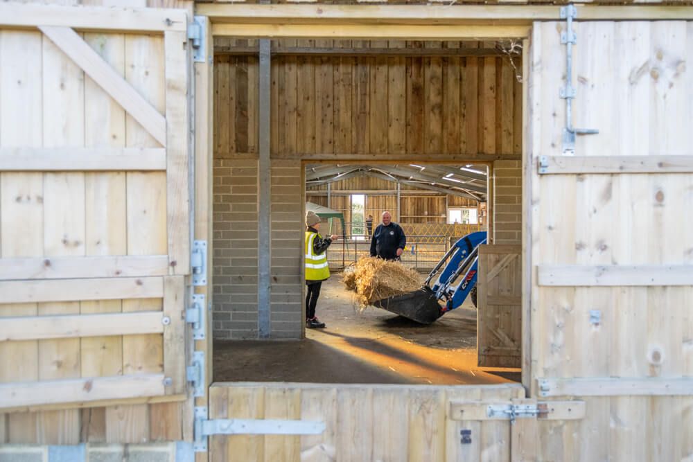 The Isle of Wight Donkey Sanctuary uses tractors to help with the movement of heavy hay and straw bundles.
