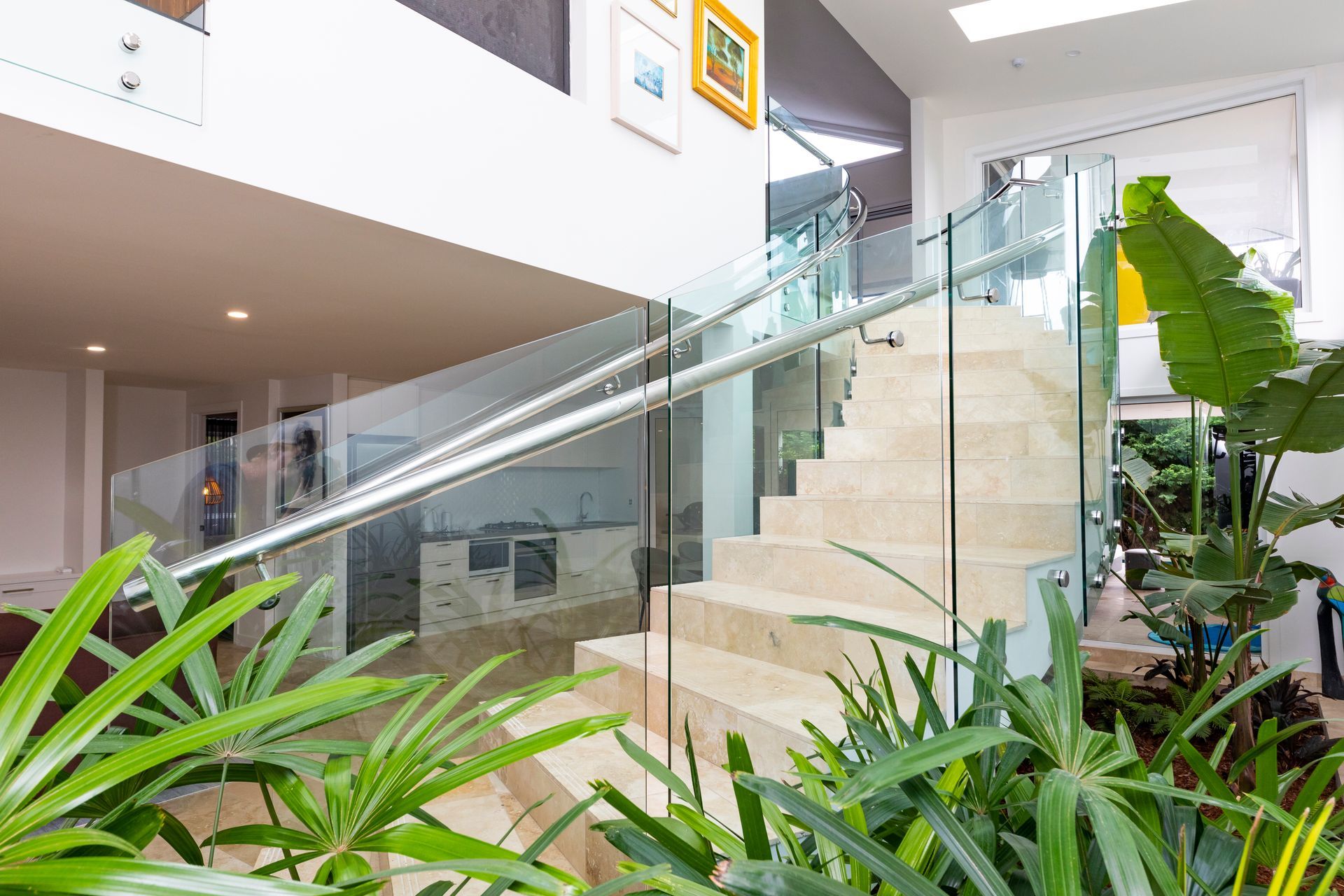Staircase with a Glass Railing and Wooden Balustrade with Built-in Lights  — Star Glass Design Pty Ltd in Mayfield, NSW