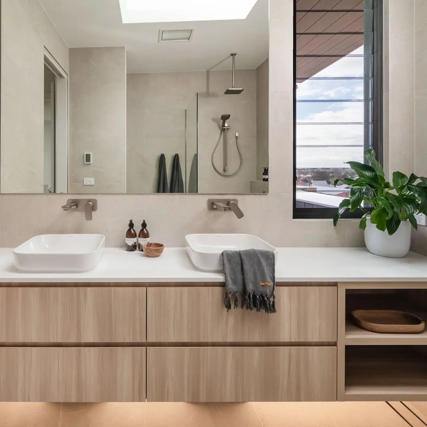 Bathroom Setting With A Two-Sink Wooden Vanity Unit And Large Mirror — Star Glass Design Pty Ltd in Mayfield, NSW