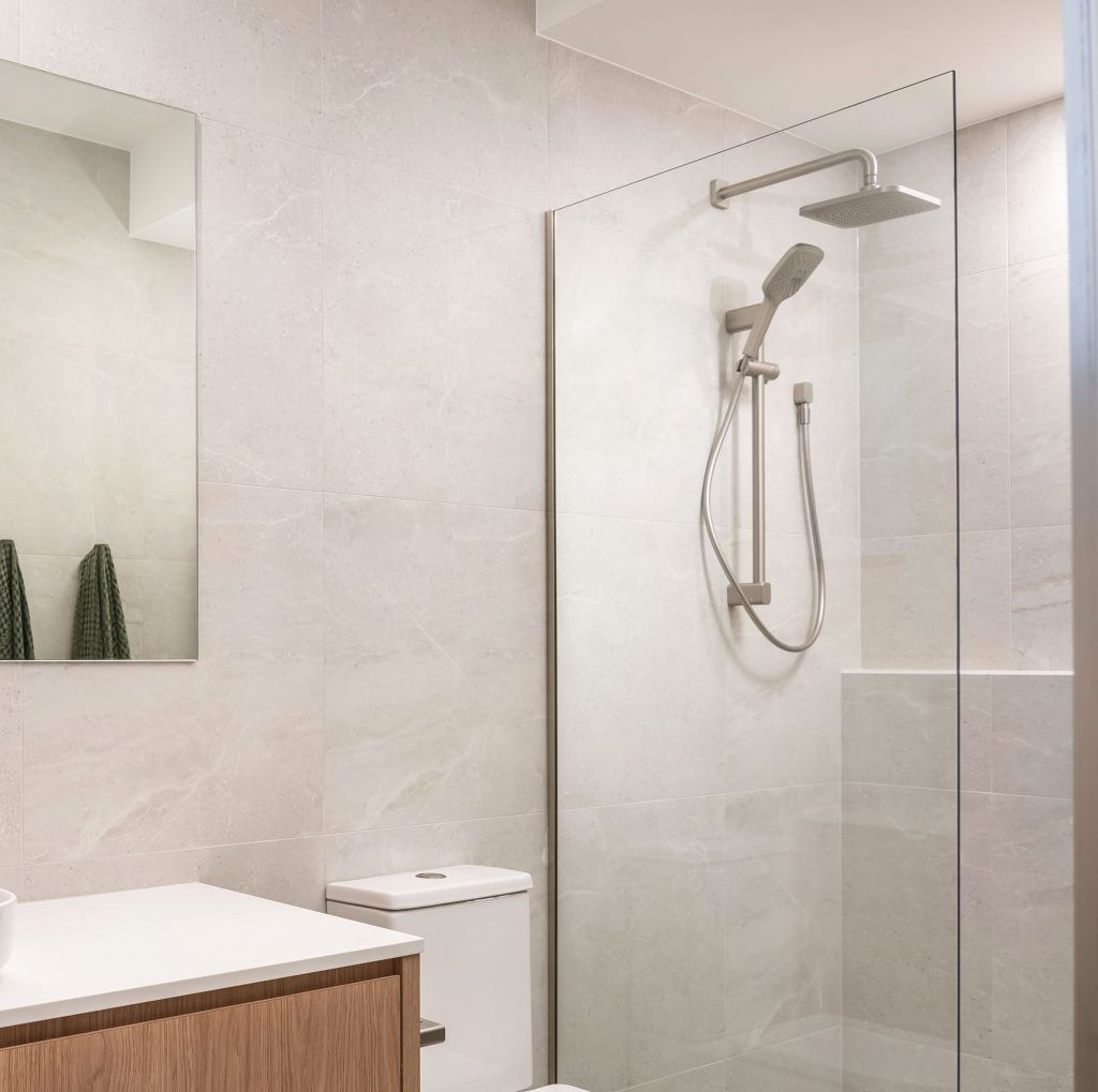 A Bathroom with A Toilet, Sink, Shower, and Mirror — Star Glass Design Pty Ltd in Mayfield, NSW