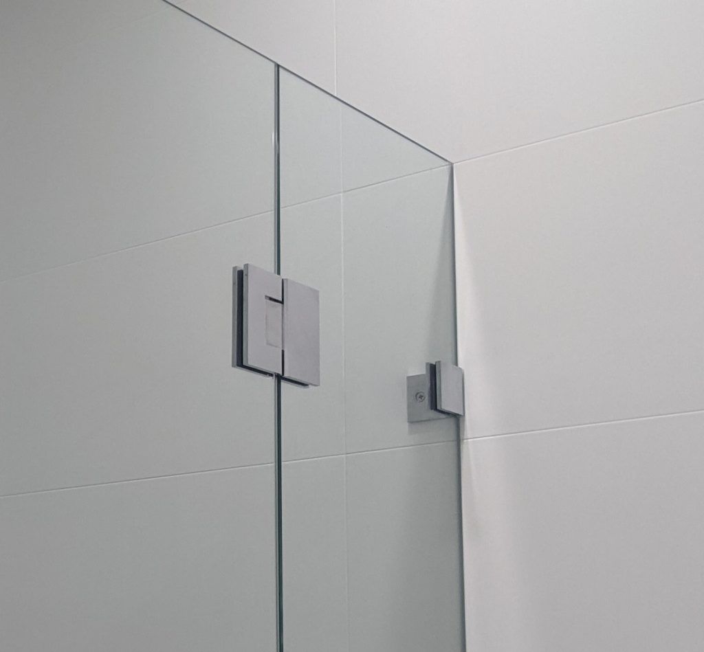 A Close up Of a Glass Shower Door in A Bathroom — Star Glass Design Pty Ltd in Mayfield, NSW