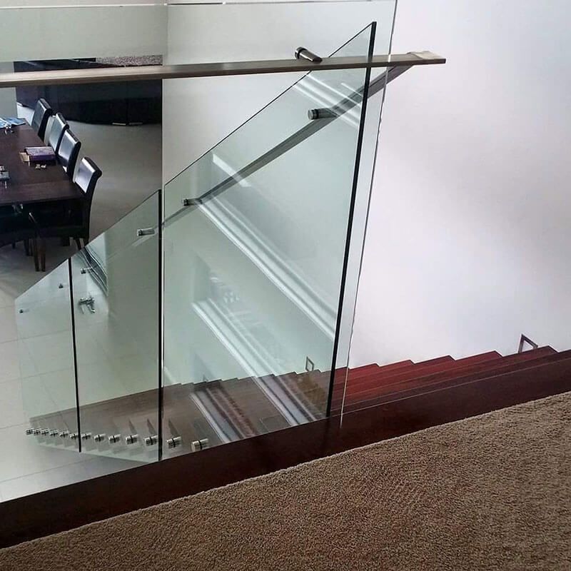 A Staircase With A Glass Railing Leading To A Dining Room  — Star Glass Design Pty Ltd in Mayfield, NSW