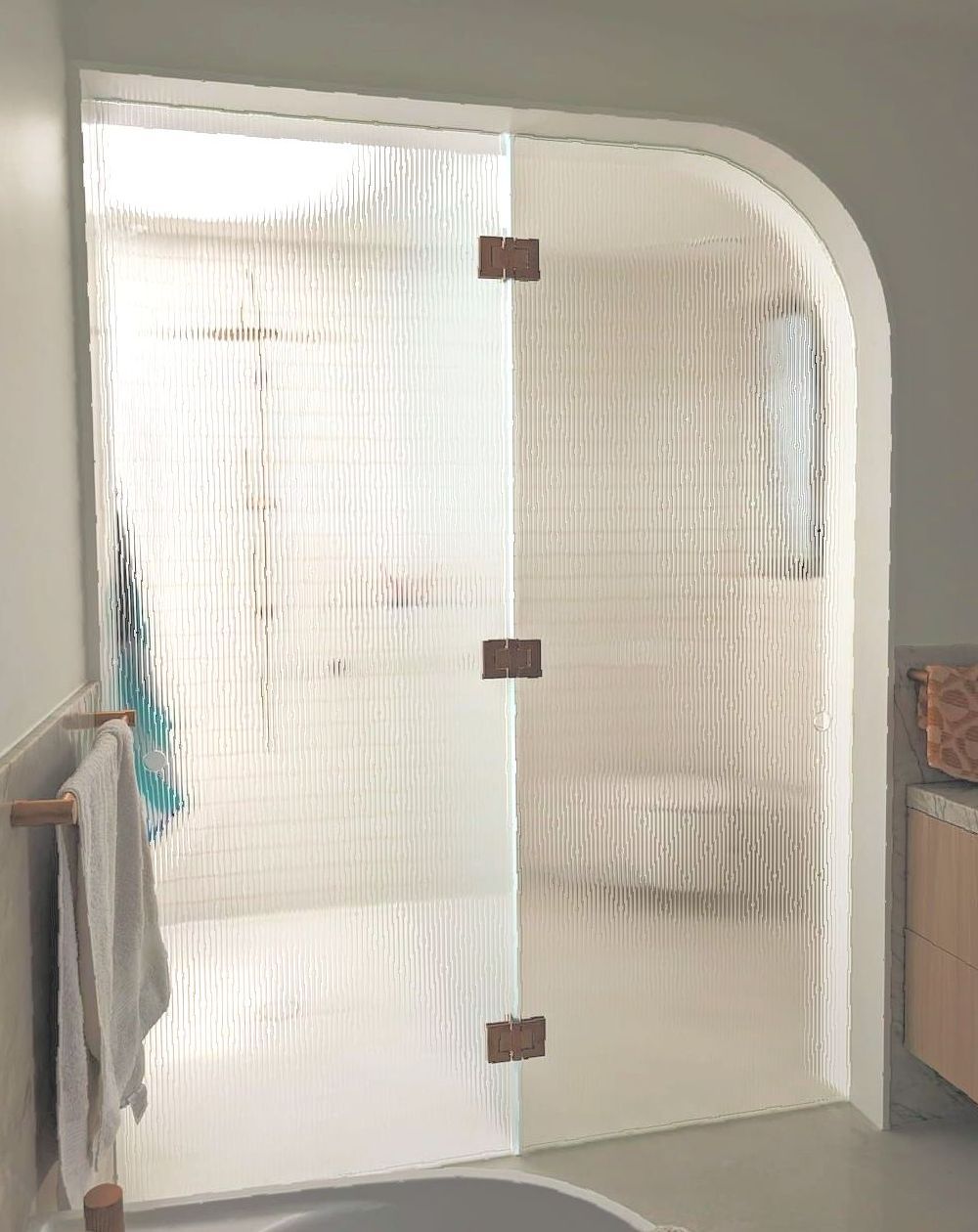 Fluted Glass Door And Panel Leading To A Shower Room — Star Glass Design Pty Ltd in Mayfield, NSW