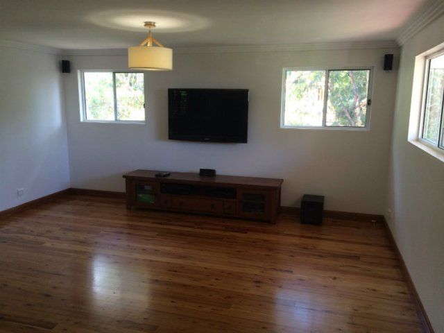 living room with shiny wood floors