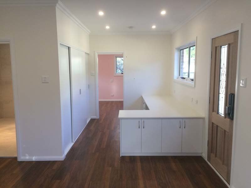 white counter and cabinets