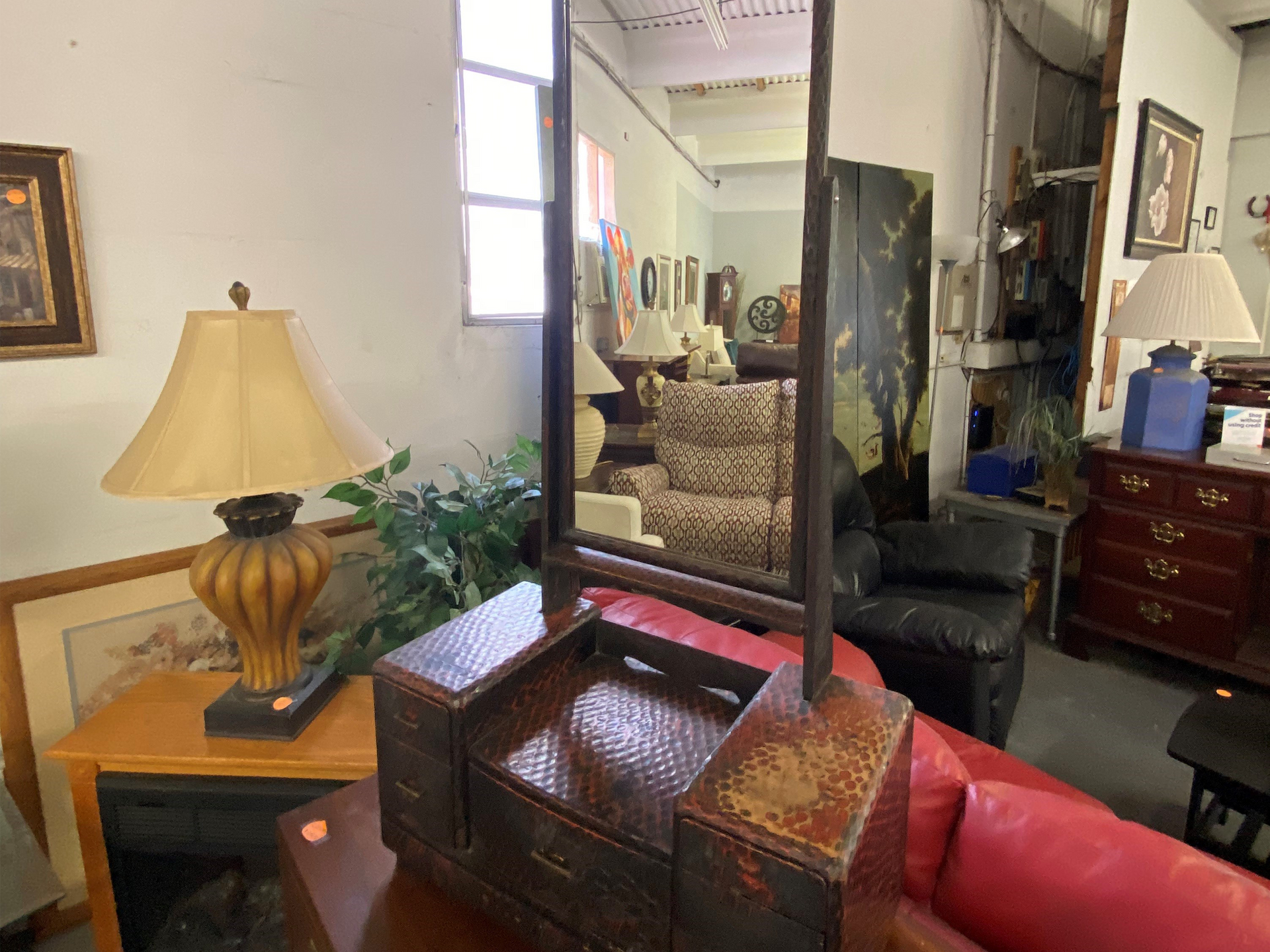 A Mirror Is Sitting on a Table in a Room — Lakeland, FL — Thomason Furniture & Mattress