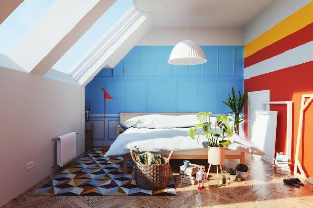 A Bedroom With Blue Walls and Red and Yellow Stripes on the Walls — Lakeland, FL — Thomason Furniture & Mattress